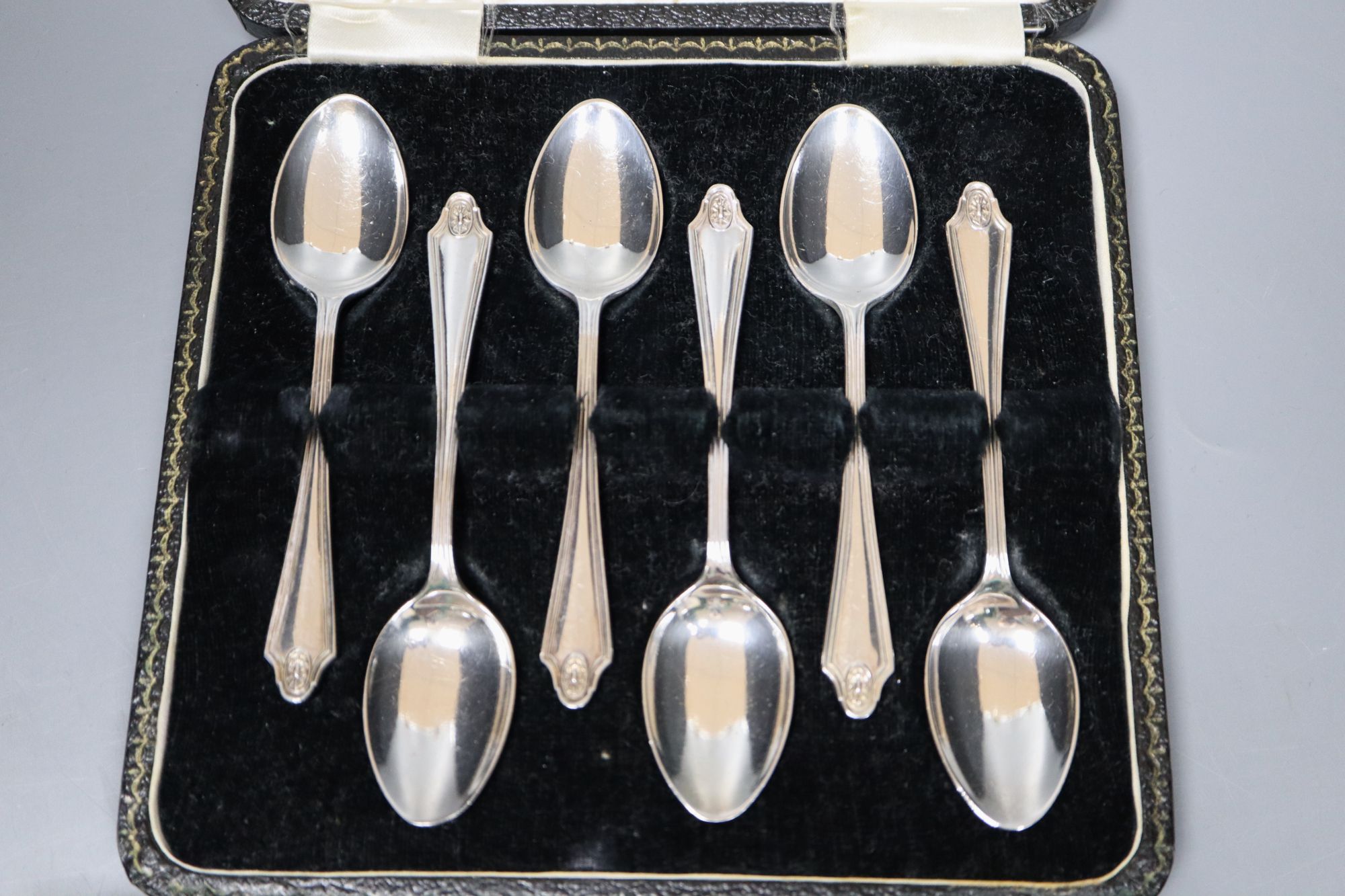 A cased set of six silver teaspoons and two single Christmas spoons